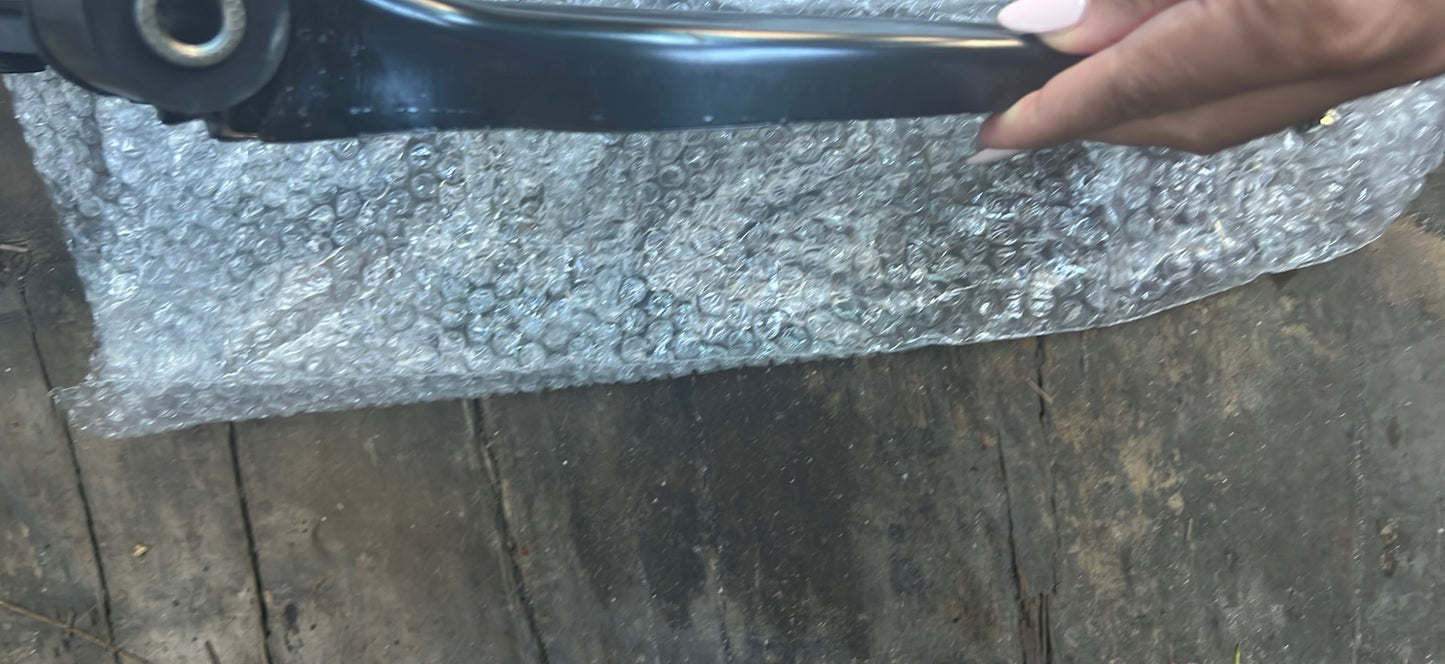 Cube lower control arm