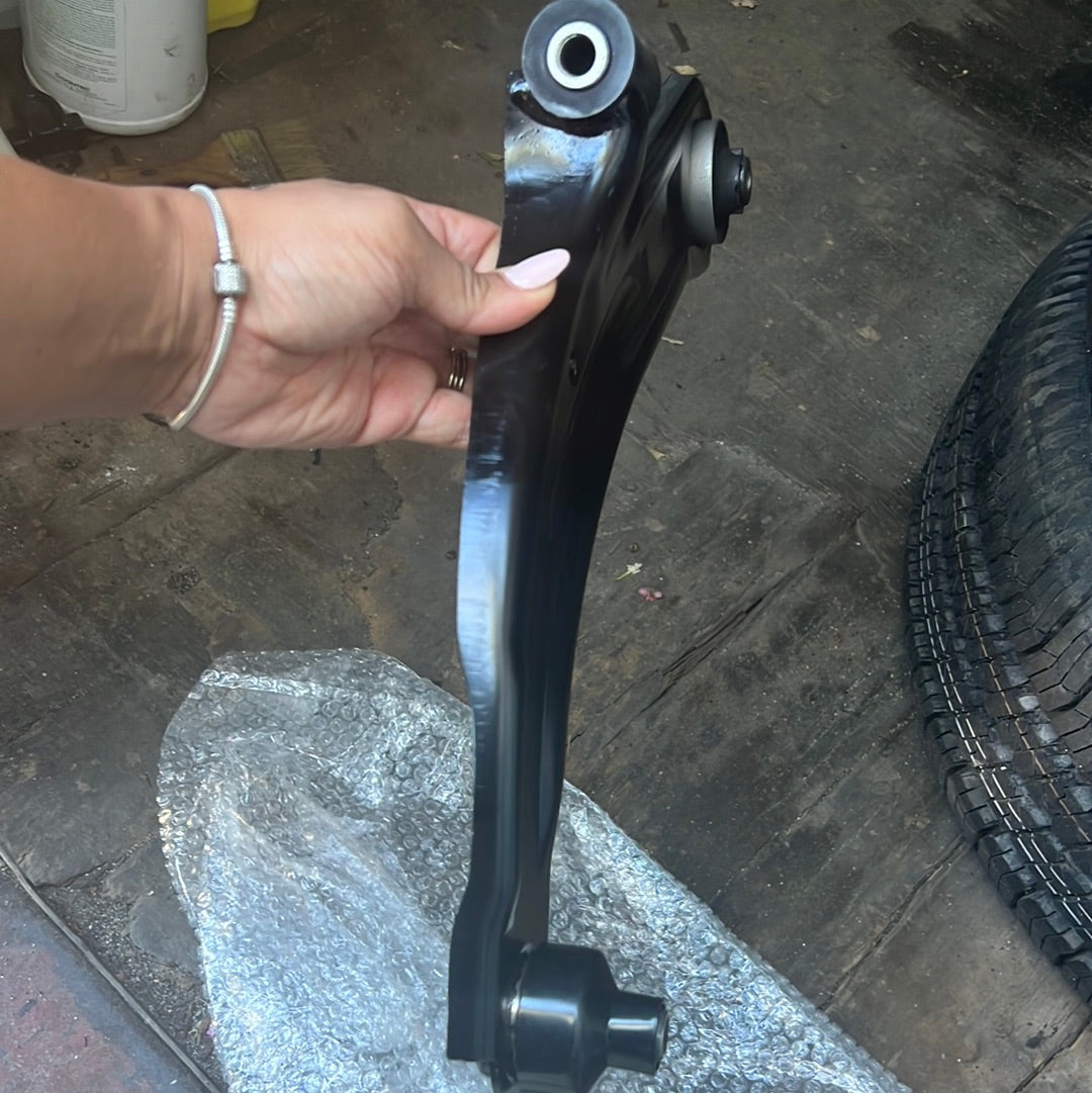 Cube lower control arm