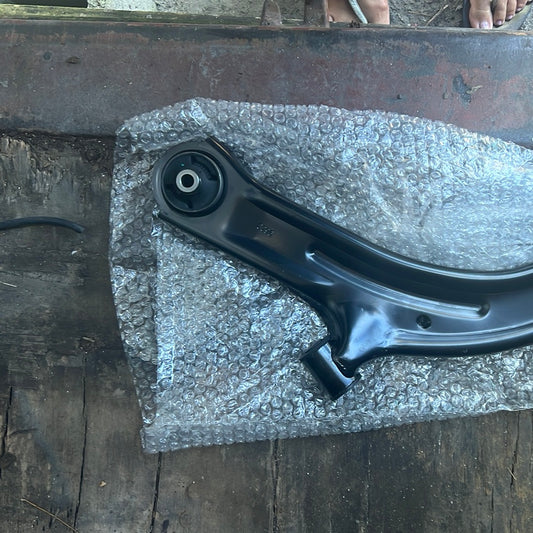 Cube lower control arm